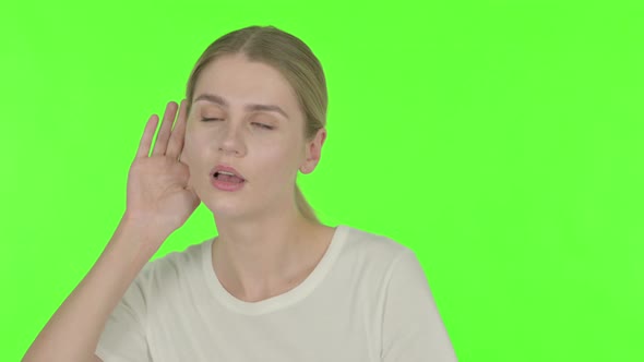 Young Woman Listening Carefully, Silence Green Screen