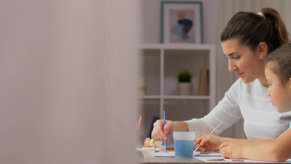 Mother with Little Daughter Drawing at Home