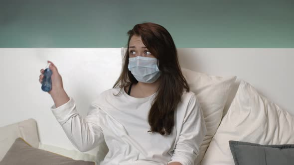 Worried Girl in Self Isolation Scared of Viruses, Spits Antibacterial Spray