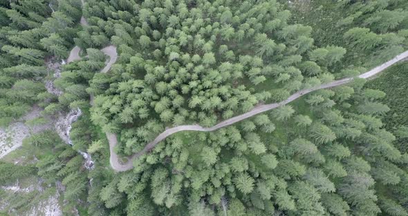 Aerial drone view of hikers hiking in the mountains.