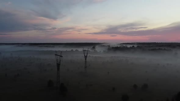 Top View of the Highway in the Fog at Sunset