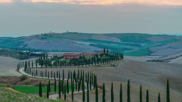 Sunrise time lapse of Tuscany landscape in Italy