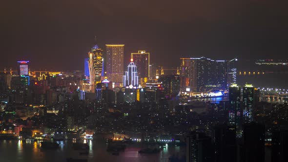 Macau Peninsula Aerial Cityscape Night Timelapse Pan Up