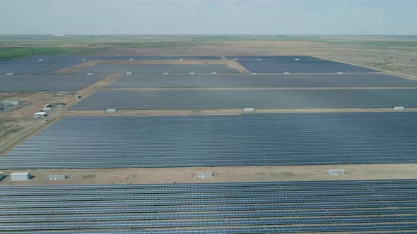 Aerial High Angle View of Huge Solar Panels Station