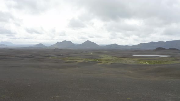 Panorama Of Mountain Range And Barren Land In Iceland At Daytime. - aerial