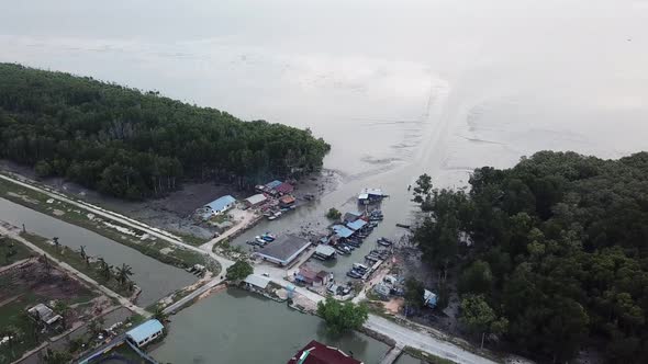 Aerial view Malays fishing village in evening at Sungai Semilang.