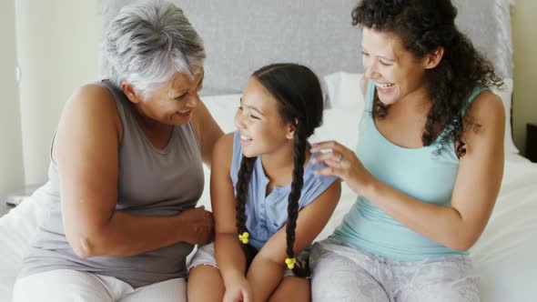 Happy family having fun on bed in bed room 4k