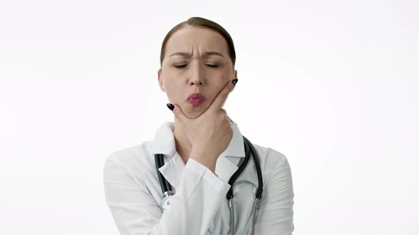 Attractive Female Therapist in Medical Coat Reacts To Poor Patients Tests