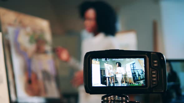 Camera is Filming an Art Class of an Africanamerican Woman