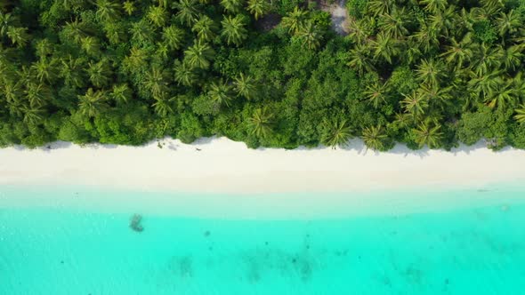 Aerial view seascape of exotic tourist beach trip by shallow water with white sand background of adv