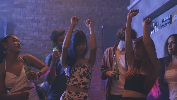 Young People Dancing at the Night Club