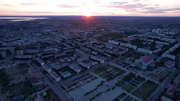 Pink Sunset Over a Small Town