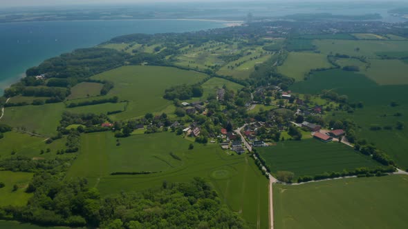 Beautiful Aerial View Landscape of Brodten Germany Flying Above Buildings Houses with Baltic Sea on