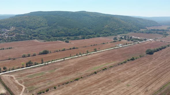 Aerial scenic footage of the beautiful fields and mountains taken in the town known as Obzor