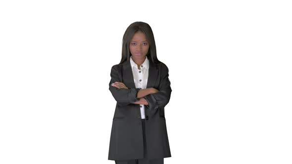 Confident African American Businesswoman with Crossed Arms on White Background
