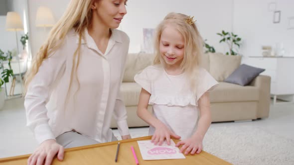 Cute Girl Making Mothers Day Card and Gifting it to Mother