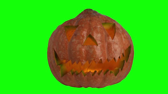 Halloween Pumpkin Head Jack Lantern with Candles Over on a Green Screen