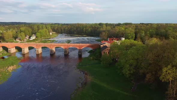 Long Old Brick Bridge, Kuldiga, Latvia Across the Venta River. Captured From Above. The Widest Water