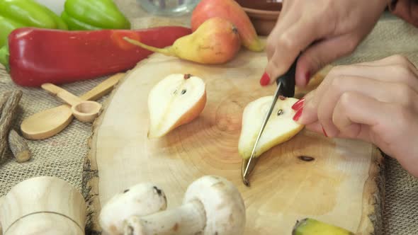 Theme Of Woman Slicing Pears