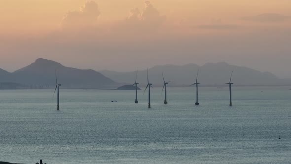 Wind Turbines in mountain during sunset