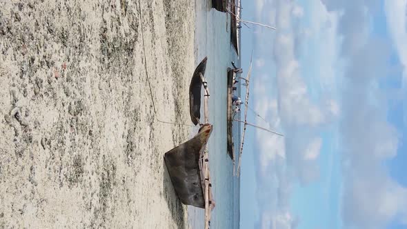 Vertical Video of Low Tide in the Ocean Near the Coast of Zanzibar Tanzania Aerial View