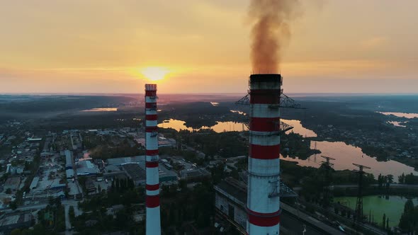Aerial Drone Footage. Coal Fire Power Station at Sunset. Static Shot
