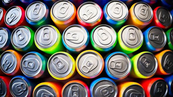 Seamless looping animation of assorted soda cans. Set of many drinks.Aerial view