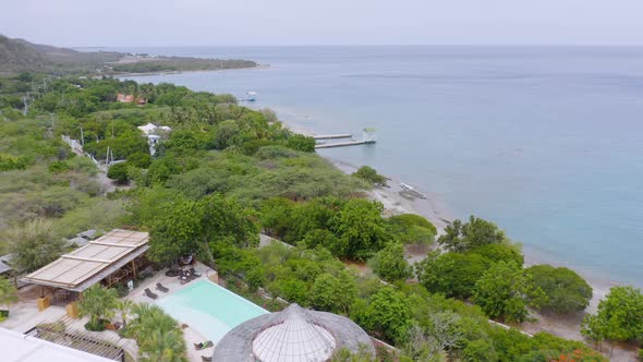 Aerial View Of Hotel And Villa Overlooking Caribbean Sea By The Bahia De Ocoa. Ocoa Bay In Azua, Dom