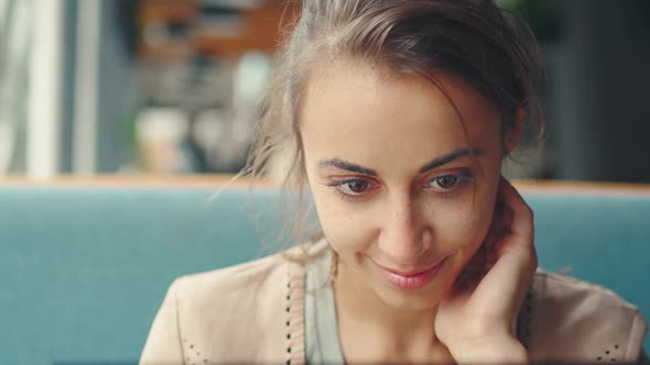 Gorgeus Young Brunette Woman Looking Something at Laptop