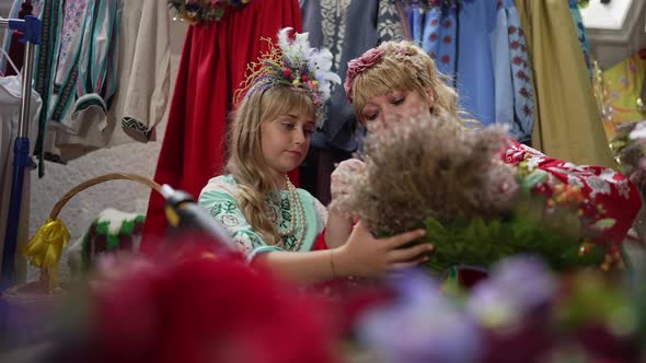 Front View Charming Pretty Ukrainian Girl Helping Talented Woman Making Traditional Accessory in