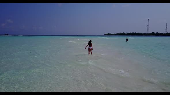 Lady sunbathing on tropical sea view beach journey by shallow lagoon with clean sand background of t