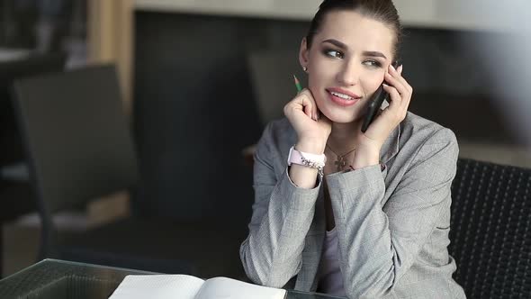 Young Business Woman with Phone Business People