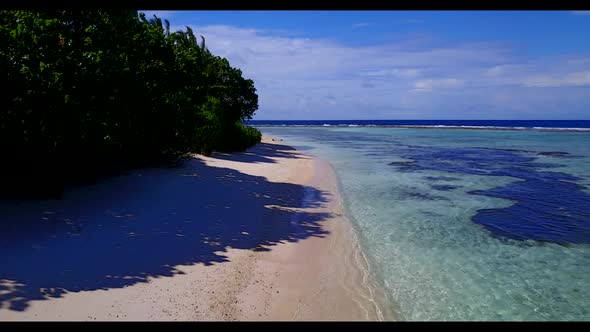 Aerial view tourism of relaxing resort beach lifestyle by transparent lagoon and bright sandy backgr