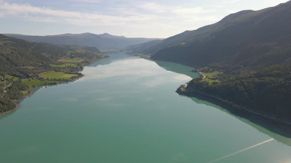 Incredible aerial shot of a mountain valley and Vagavatn lake in Norway