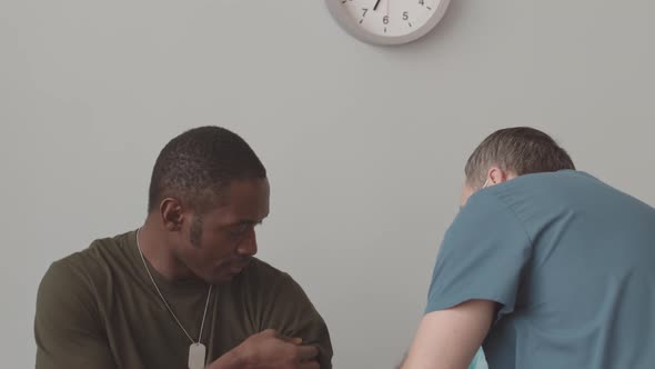 African American Army Officer Being Vaccinated against Covid alt