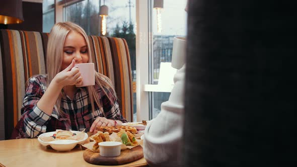 A  Couple Having Lunch in Cafe