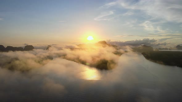 View of sunset or sunrise. Over river and misty cloud in river. Mountain and sky sunset background