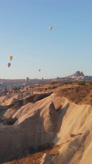 Vertical Video of Hot Air Balloons Flying in the Sky Over Cappadocia Turkey