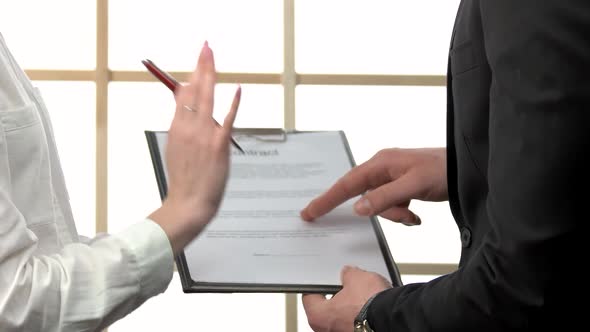 Businessman Is Signing a Contract