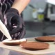 Pastry Chef is Filling Cookies with Cream and Jam Making Small Cakes - VideoHive Item for Sale