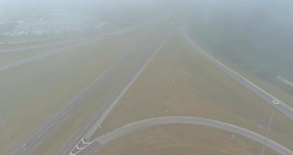 Misty Morning Over a Desolate Country Road with Bridge Across US 65 Highway Near Satsuma Alabama