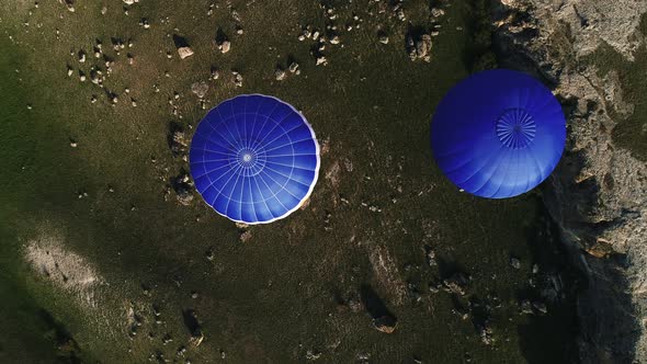 Two colorful hot air balloon in the countryside area