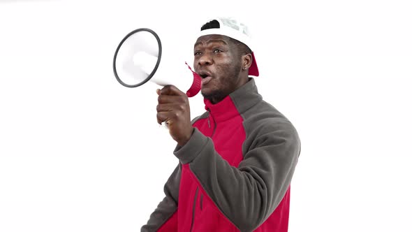 Young Delivery Man Employee with Megaphone Screaming Loud and Protesting  Isolated on White