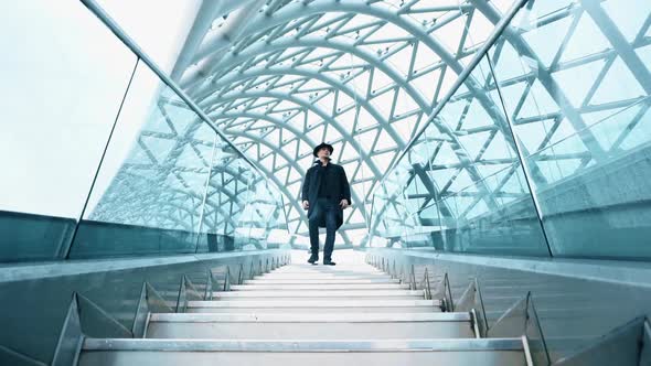 Man Walking on the Bridge