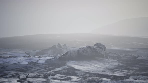 Antarctic Mountains with Snow in Fog