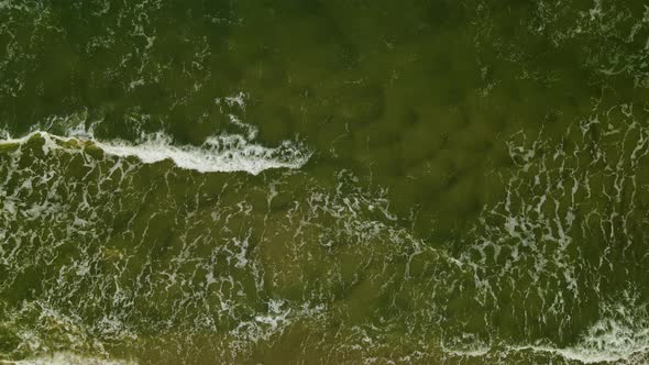 Dark Sea Waves Splashing On The Shore In Wladyslawowo, Pomerelia Region, Poland - aerial drone, top-