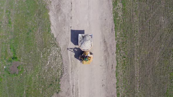 Groundworks Tipper Moving Earth During Construction