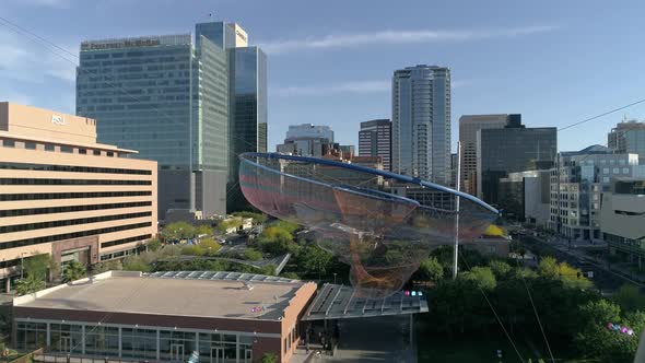 Aerial shot of a modern sculpture in a park alt