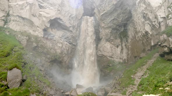 Dirty Waterfall Sultan High in the Mountains Near Elbrus in Summer