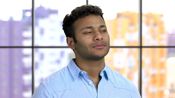 Hindu Man Looking Up and Thinking About Something Pleasant